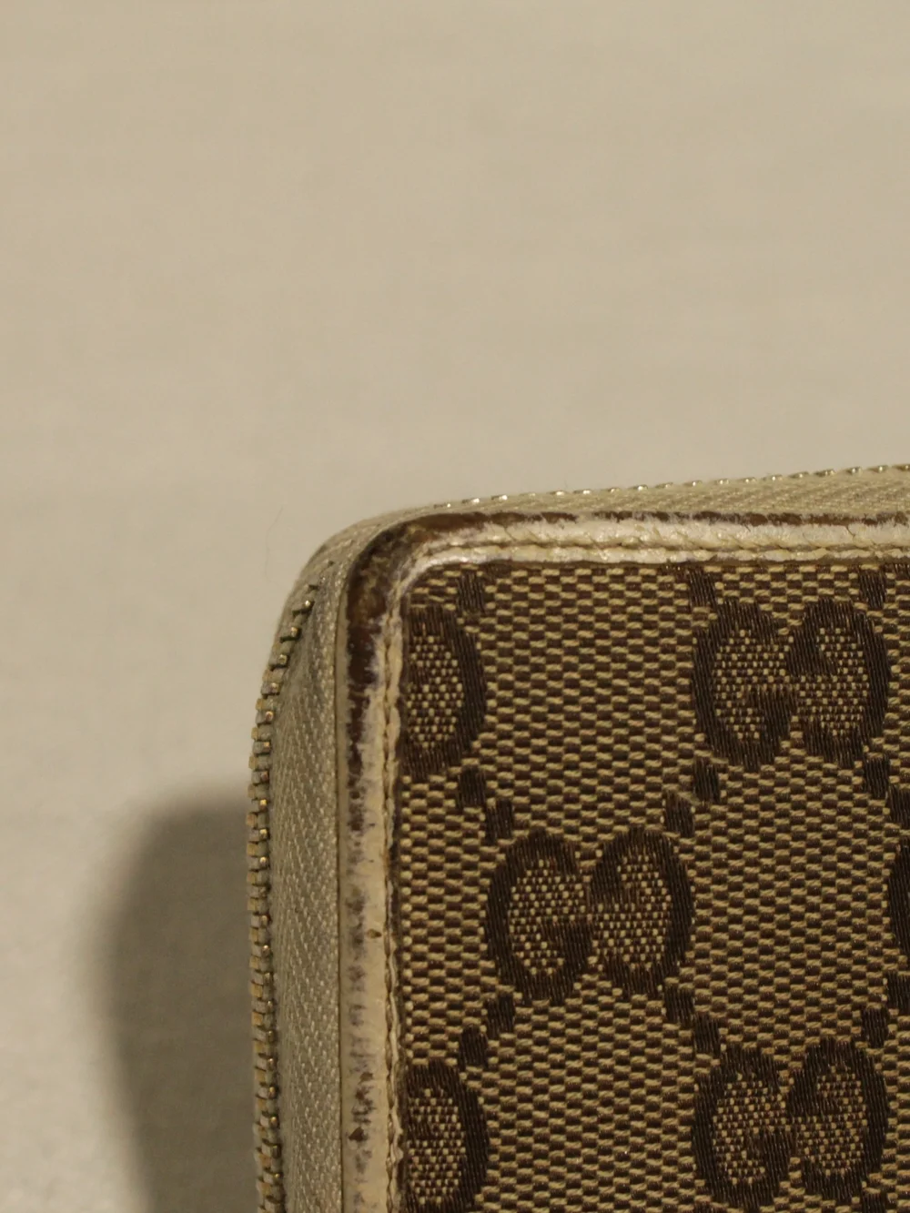 Gucci Brown Signature Canvas Zip Wallet